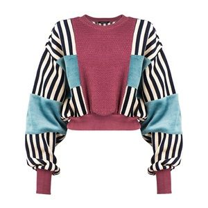 Sebnem Gunay sweater worn by Gigi Hadid